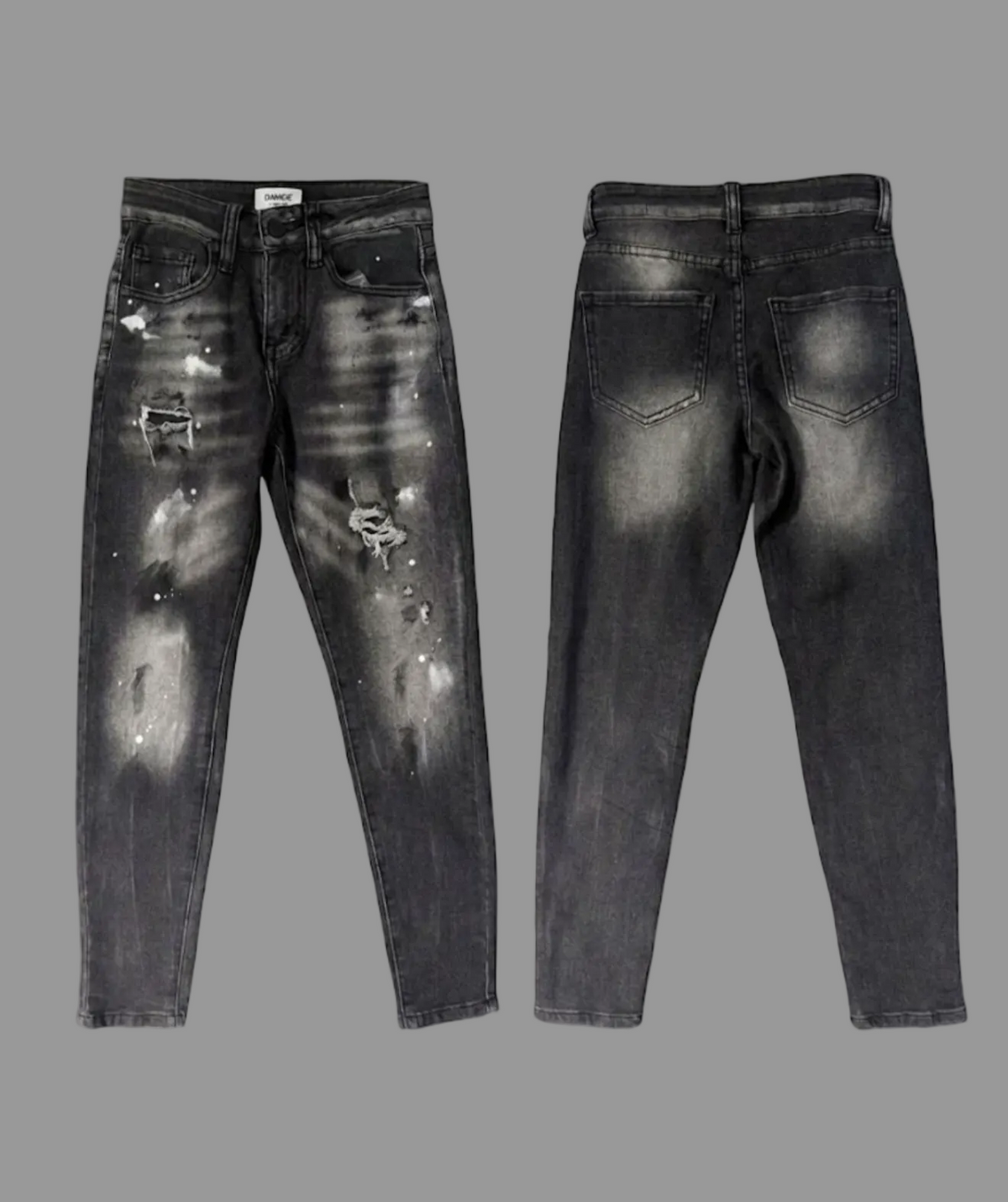 Jeans bambino con ritocchi in bianco e strappi